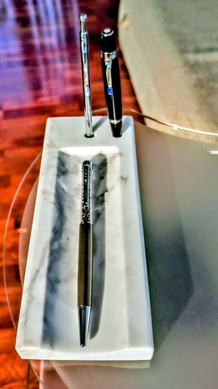 SIGNATURE -  Mármol Blanco Griego